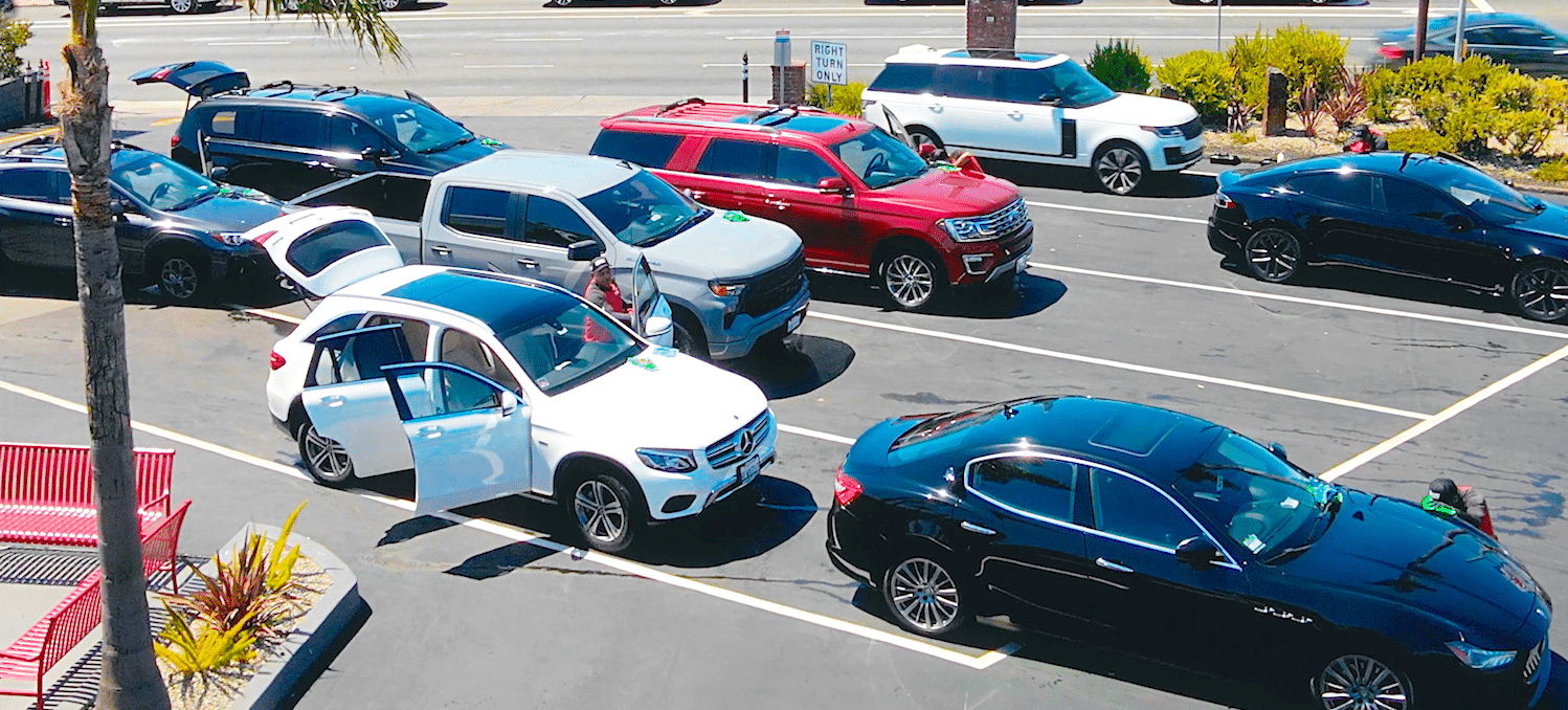 Red Carpet lot full of clean cars